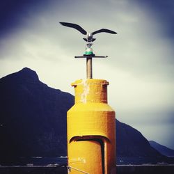 Low angle view of sculpture against sky