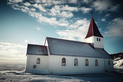 Church building on sunny day at coast