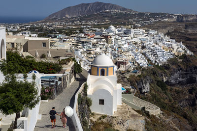 High angle view of city and buildings against sky