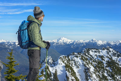Hiker looking off into distant mountains