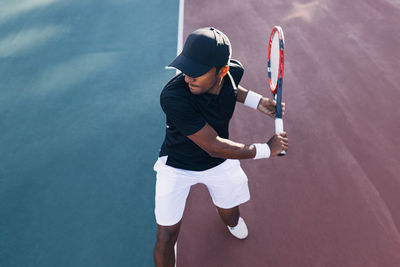 Man playing tennis