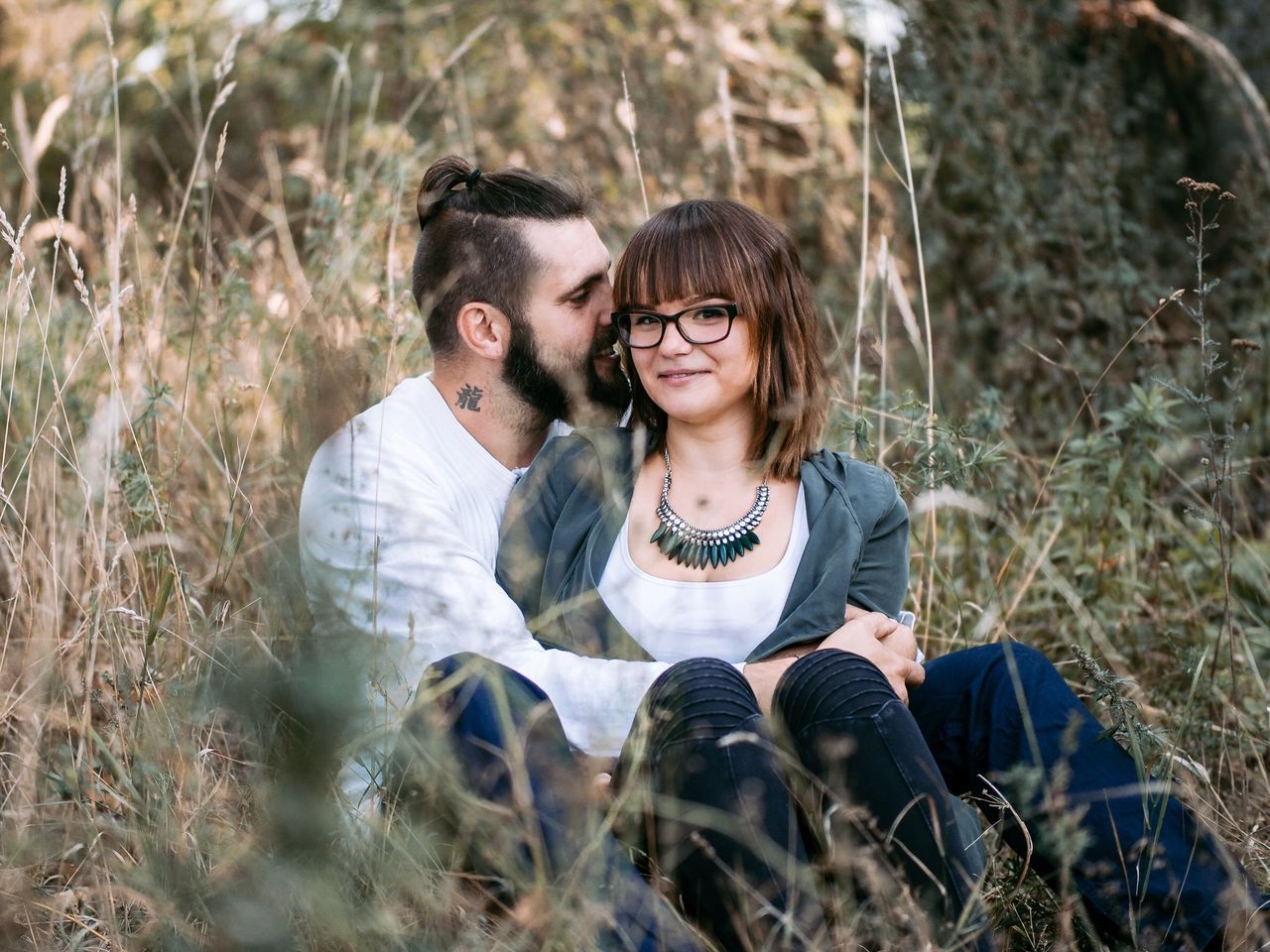 two people, heterosexual couple, young adult, couple - relationship, togetherness, young men, young women, grass, love, men, lifestyles, women, smiling, adult, adults only, outdoors, portrait, happiness, people, nature, day, human body part