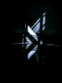 Close-up of food on table against black background