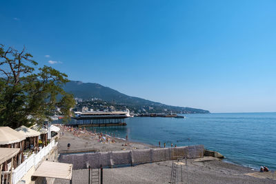 Scenic view of sea against blue sky