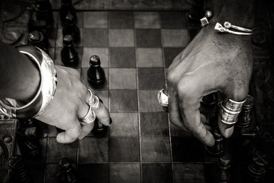 High angle view of people on tiled floor