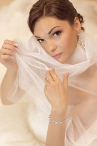High angle portrait of bride wearing wedding dress
