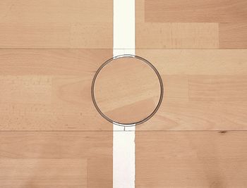 Renewal wooden floor of sports hall with new lacquered surface. schooll gym hall