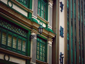 Low angle view of building by street