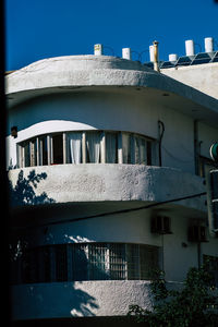 Low angle view of building against blue sky