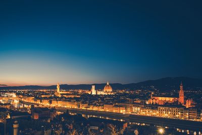 Illuminated city at night