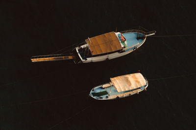High angle view of sailboat moored on sea