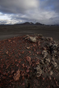 Aerial view of barren landscape against sky