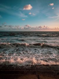 Scenic view of sea against sky during sunset