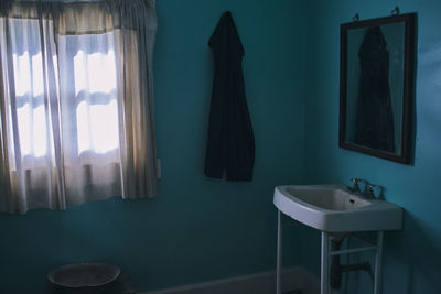 Clothes hanging on table at home