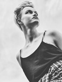 Portrait of young woman looking away