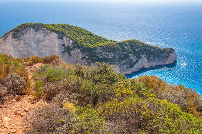 High angle view of rocks on sea