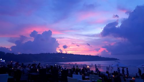 Panoramic view of boats in sea during sunset