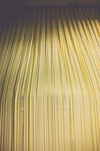 Full frame shot of spaghetti drying in factory