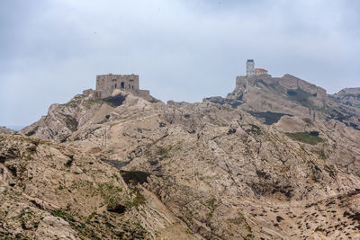 Low angle view of fort against sky