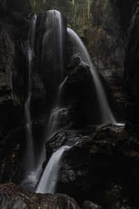 Scenic view of waterfall in forest