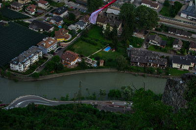 High angle view of buildings and trees in city