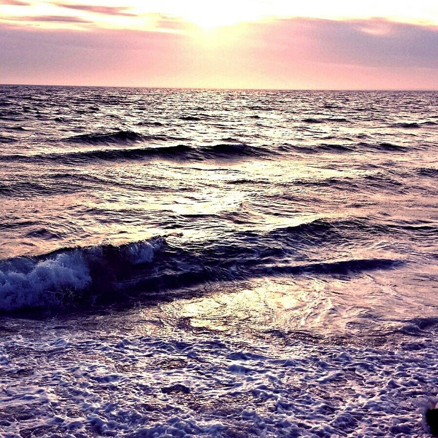 sea, water, sunset, scenics, tranquil scene, beauty in nature, tranquility, horizon over water, wave, beach, nature, sky, rippled, idyllic, sun, waterfront, shore, seascape, reflection, orange color