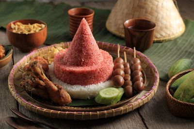 Cone shape red and white rice called nasi tumpeng same as indonesian national flag 