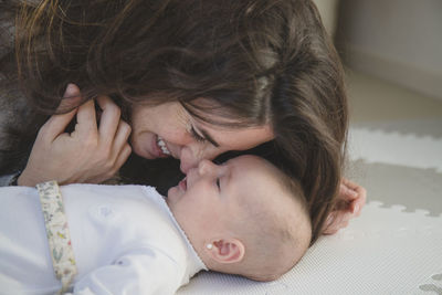 High angle view of mother and daughter at home