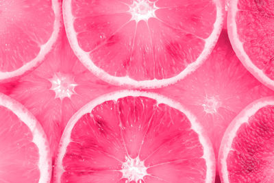 Full frame shot of pink slices