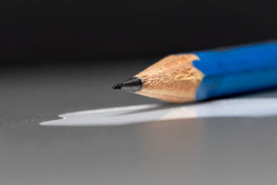 Close-up of pencils on table