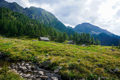 Scenic view of landscape and mountains against sky