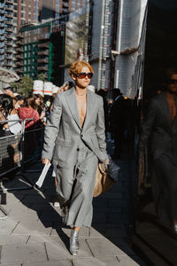 Man walking on street in city