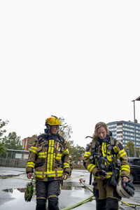 Female firefighters talking together