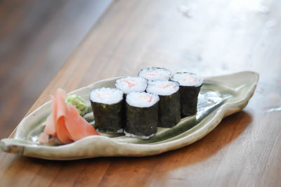 Close-up of sushi served on table