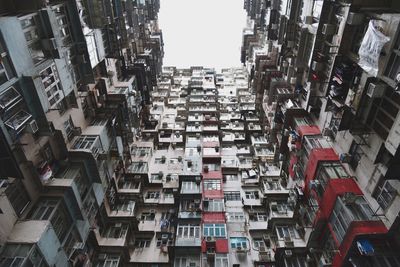 Low angle view of buildings in city against sky