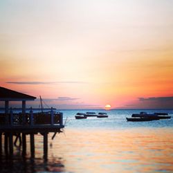 Scenic view of sea at sunset
