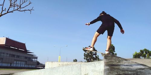 Low angle view of man skateboarding