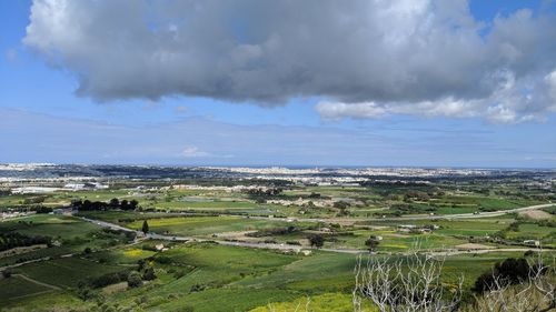 High angle view of agricultural field against sky