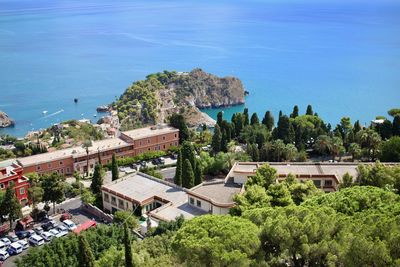 High angle view of townscape by sea