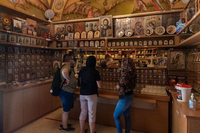 Group of people standing in store