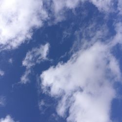 Low angle view of clouds in blue sky