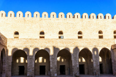 Low angle view of historical building against clear sky