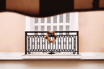 Close-up of closed window on wall of building