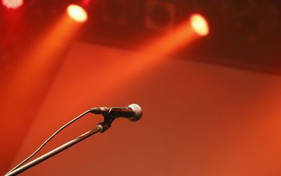 Close-up of stage lamp and microphone