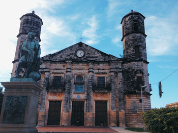 Low angle view of old building against sky