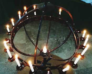 Close-up of lit light bulb