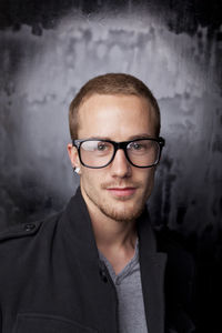 Portrait of young man wearing eyeglasses