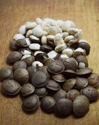 Close-up of coffee beans on table