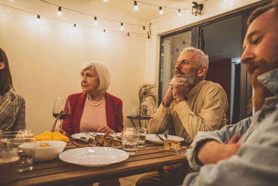 Portrait of senior woman sitting at home