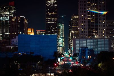 Illuminated buildings in city at night